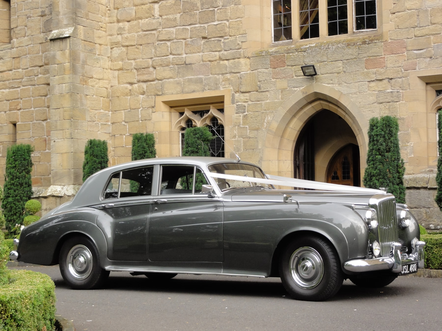 Silver Bentley outside Venue